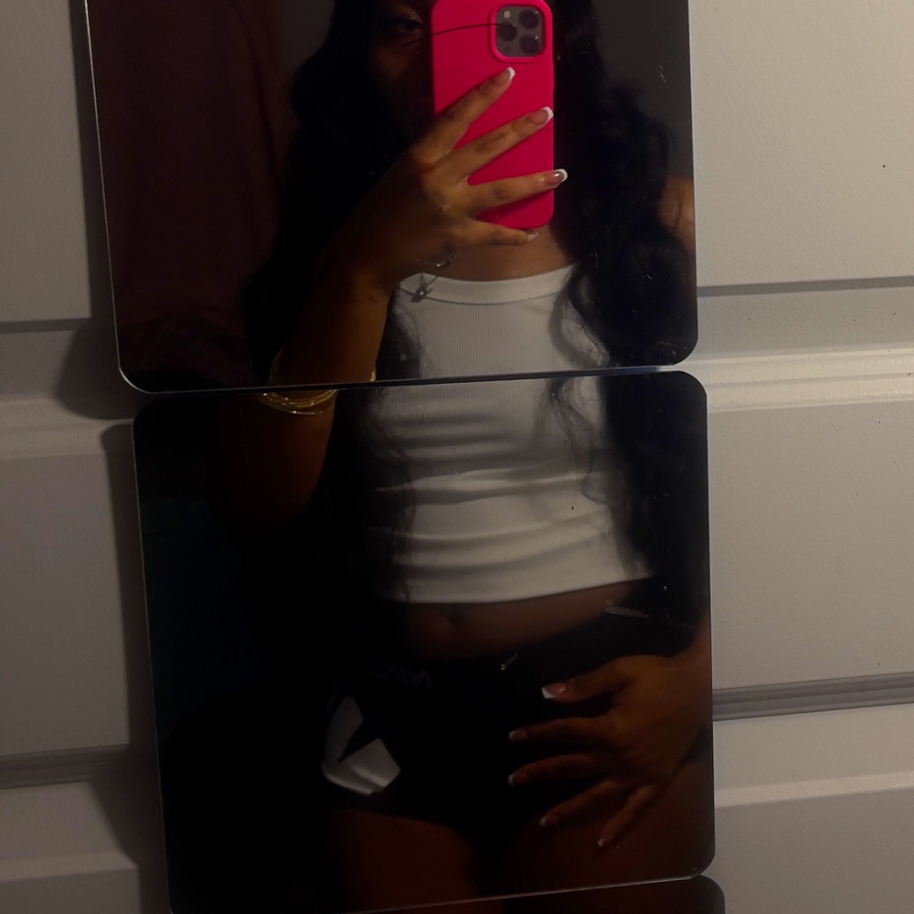 White tank top , , it’s the color as when I bought it no stains .